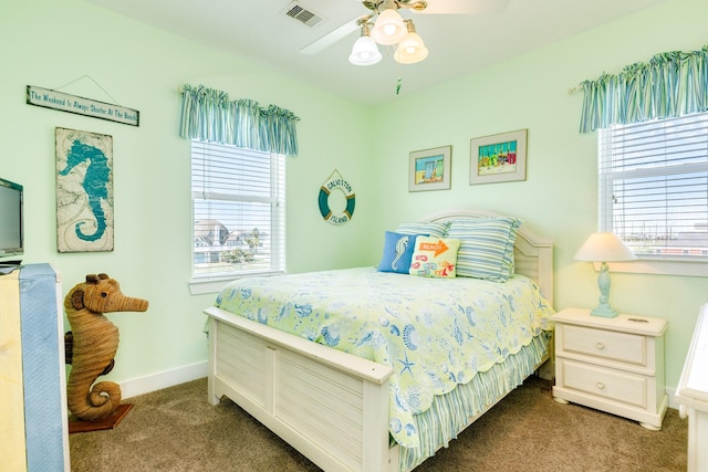 22831 Gulf Dr, Galveston, TX 77554 - bedroom with carpet floors and a ceiling fan