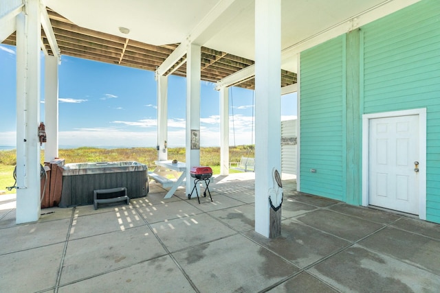 22831 Gulf Dr, Galveston, TX 77554 - view of patio / terrace featuring a hot tub