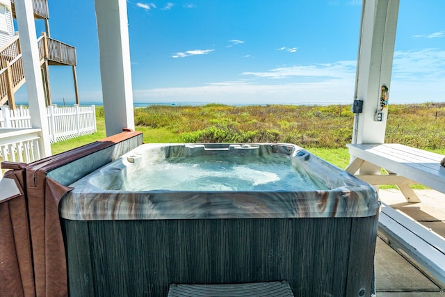 22831 Gulf Dr, Galveston, TX 77554 - deck featuring a hot tub and area for grilling