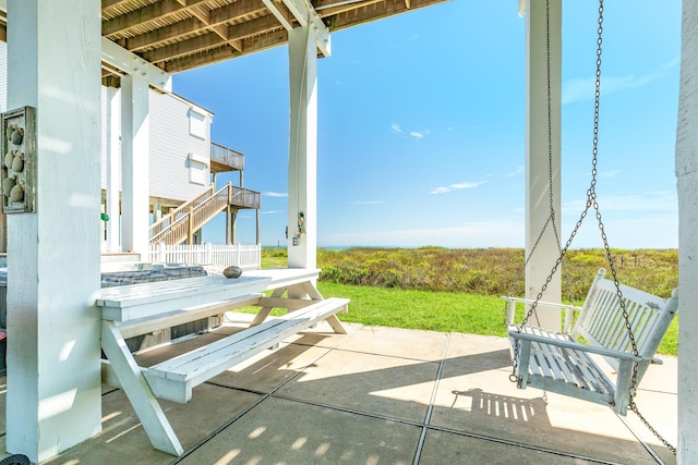 22831 Gulf Dr, Galveston, TX 77554 - view of patio / terrace with stairs