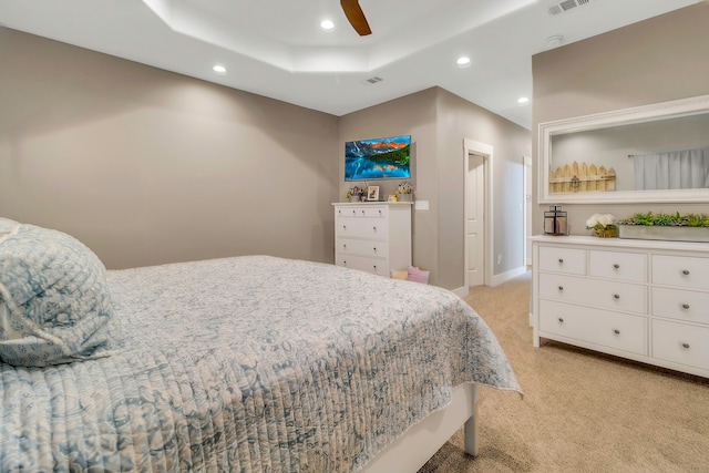 468 Brahman, Onalaska, TX 77360 - bedroom featuring recessed lighting, light colored carpet, a raised ceiling, and ceiling fan