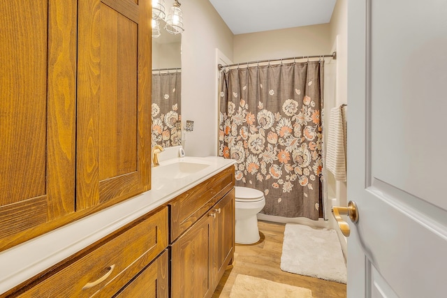 468 Brahman, Onalaska, TX 77360 - full bath featuring vanity, wood finished floors, and a shower with curtain