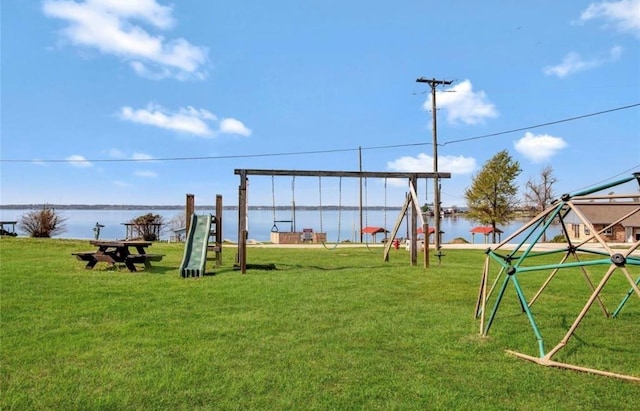 468 Brahman, Onalaska, TX 77360 - view of jungle gym with a yard and a water view