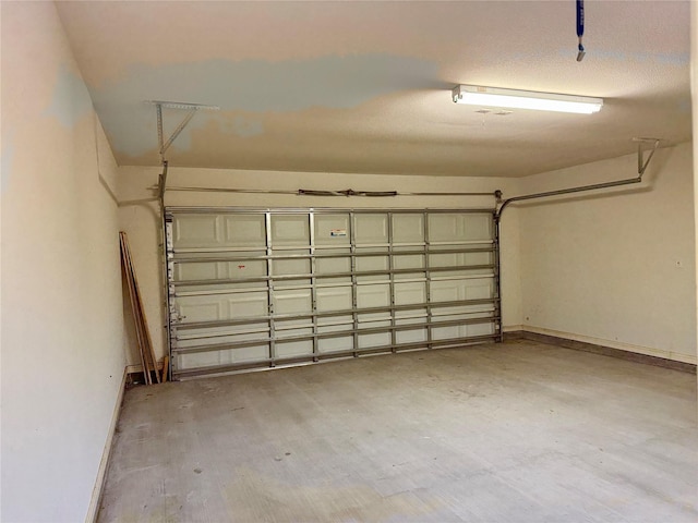 1140 Thomas Dr, Angleton, TX 77515 - garage with baseboards