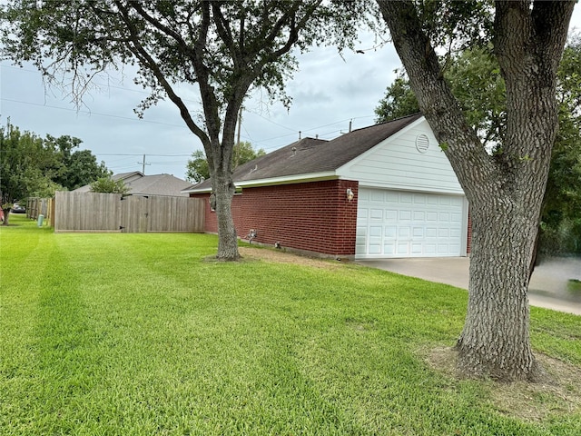1140 Thomas Dr, Angleton, TX 77515 - view of yard featuring a detached garage and an outdoor structure