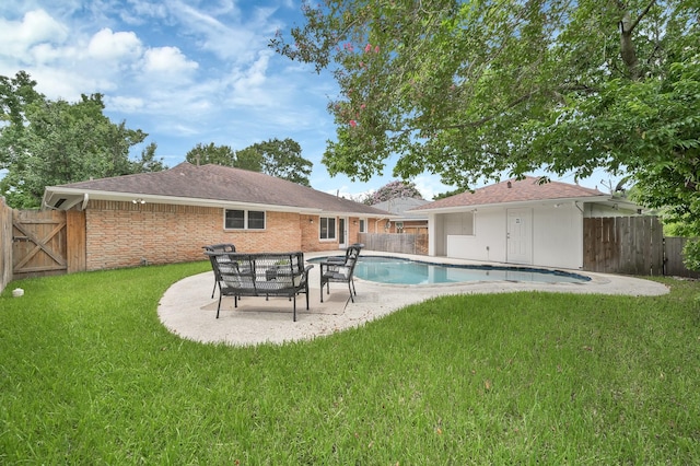 4310 Wigton Dr, Houston, TX 77096 - back of property with a fenced backyard, a patio, and a gate
