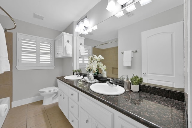 4310 Wigton Dr, Houston, TX 77096 - full bath with double vanity, tile patterned floors, and shower / bathtub combination