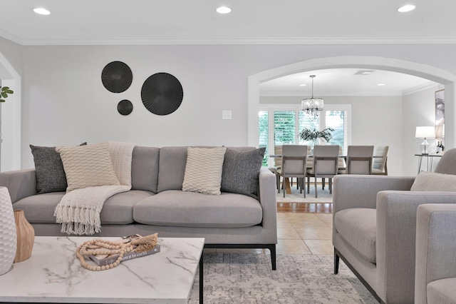 4310 Wigton Dr, Houston, TX 77096 - living area featuring arched walkways, a chandelier, recessed lighting, and ornamental molding