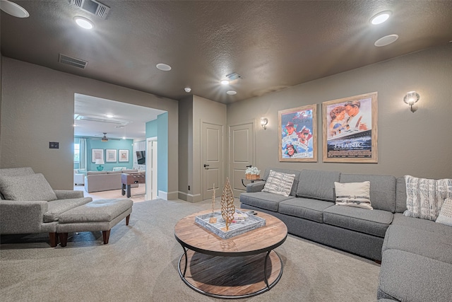 2418 Sandhill Crest Ln, Brookshire, TX 77423 - living area featuring light carpet, a textured ceiling, a ceiling fan, and recessed lighting