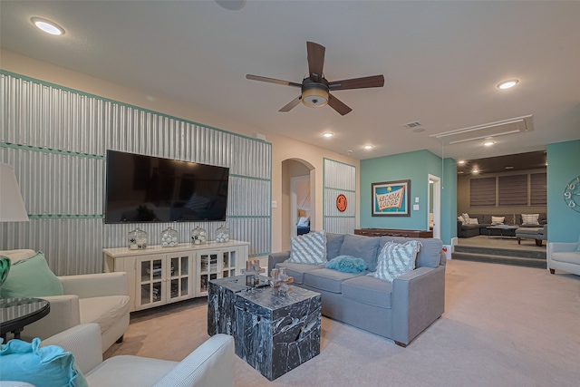 2418 Sandhill Crest Ln, Brookshire, TX 77423 - carpeted living area featuring attic access, ceiling fan, arched walkways, and recessed lighting