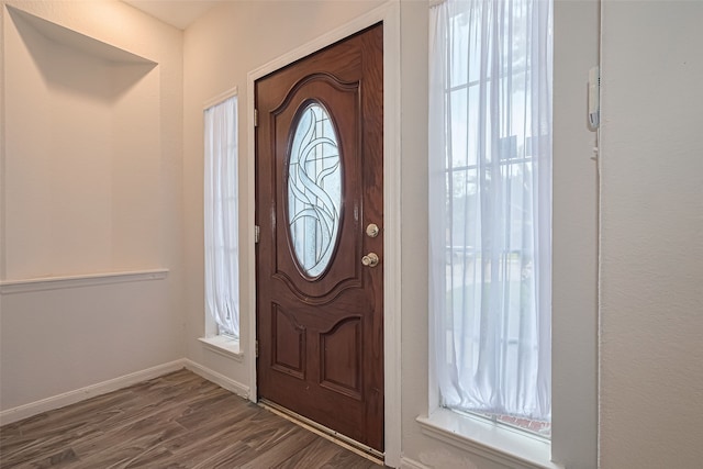 10210 Squirehill Ct, Houston, TX 77070 - foyer entrance with dark wood-style flooring and baseboards