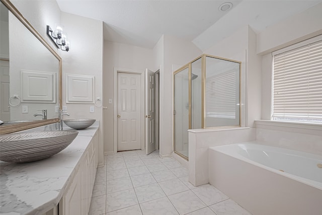 10210 Squirehill Ct, Houston, TX 77070 - bathroom with a shower stall, a bath, double vanity, and marble finish flooring