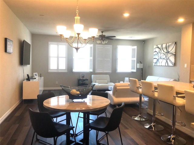 9470 Caddo Ridge Ln, Cypress, TX 77433 - dining space with dark wood-style floors, a chandelier, recessed lighting, and a ceiling fan