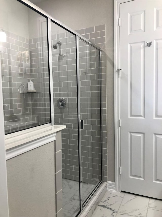 9470 Caddo Ridge Ln, Cypress, TX 77433 - bathroom with marble finish floors and a shower stall