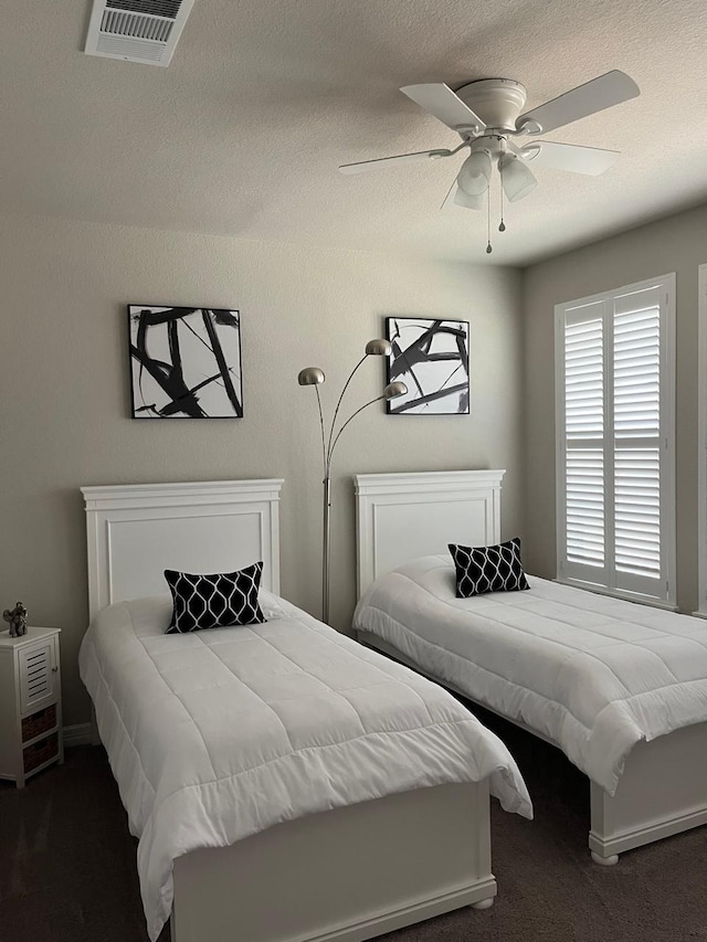 9470 Caddo Ridge Ln, Cypress, TX 77433 - carpeted bedroom featuring ceiling fan