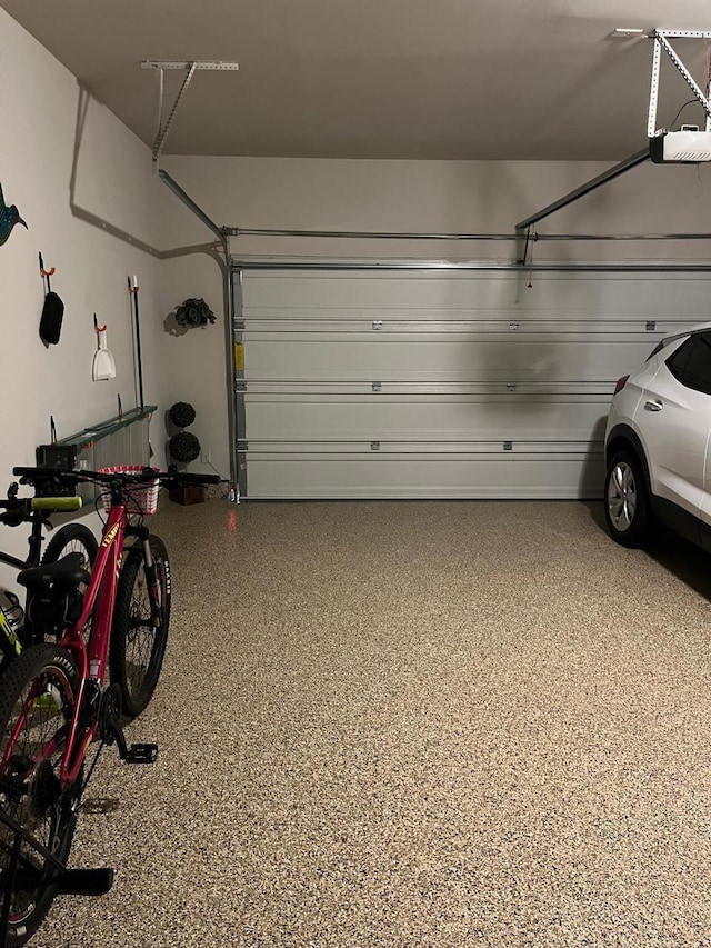 9470 Caddo Ridge Ln, Cypress, TX 77433 - garage with a garage door opener