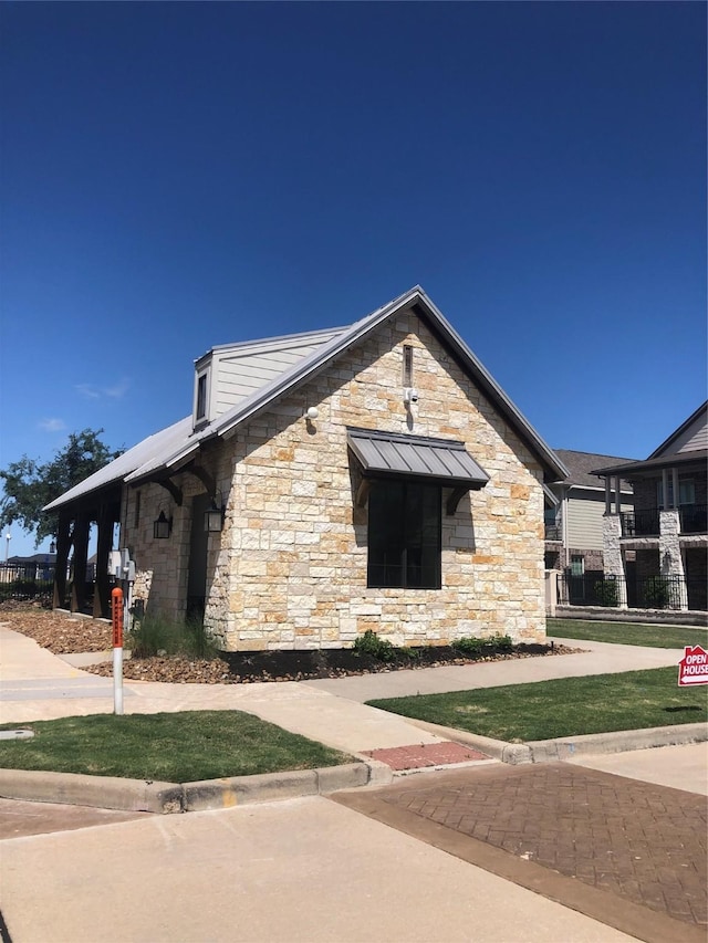 9470 Caddo Ridge Ln, Cypress, TX 77433 - view of side of home featuring stone siding