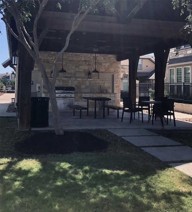 9470 Caddo Ridge Ln, Cypress, TX 77433 - view of patio with area for grilling