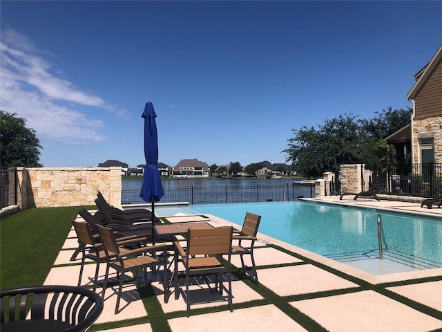 9470 Caddo Ridge Ln, Cypress, TX 77433 - community pool featuring a patio