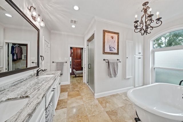 25 The Oval St, Sugar Land, TX 77479 - bathroom with double vanity, a freestanding bath, a shower stall, recessed lighting, and a chandelier
