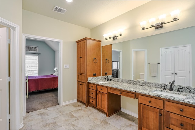 130 Canary Ln, Coldspring, TX 77331 - ensuite bathroom featuring double vanity and toilet
