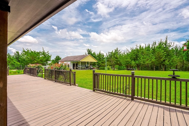 130 Canary Ln, Coldspring, TX 77331 - wooden deck featuring a lawn