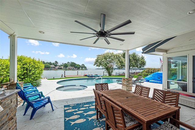 3114 Canterbury Ln, Montgomery, TX 77356 - view of patio with a ceiling fan, a water view, an in-ground hot tub, an outdoor pool, and outdoor dining area