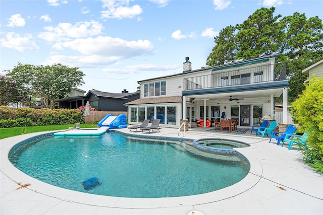 3114 Canterbury Ln, Montgomery, TX 77356 - view of pool featuring a ceiling fan, a patio area, and a pool with connected hot tub