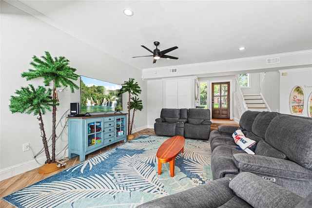 3114 Canterbury Ln, Montgomery, TX 77356 - living room with wood finished floors, stairs, ornamental molding, and a ceiling fan