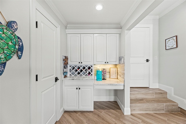 3114 Canterbury Ln, Montgomery, TX 77356 - mudroom featuring light wood-style floors and crown molding