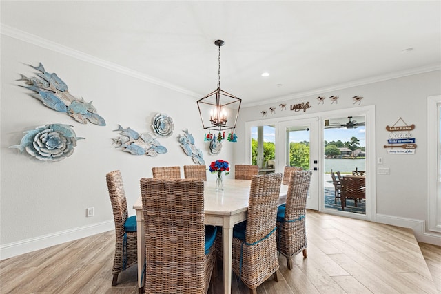 3114 Canterbury Ln, Montgomery, TX 77356 - dining area with ornamental molding, light wood-style floors, a chandelier, and recessed lighting