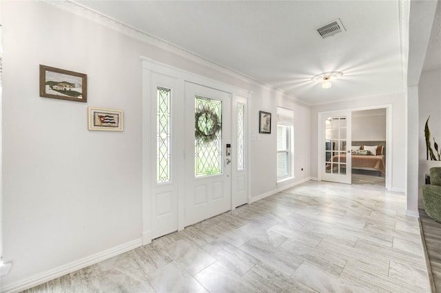 11715 Cypresswood Dr, Houston, TX 77070 - foyer featuring french doors and crown molding