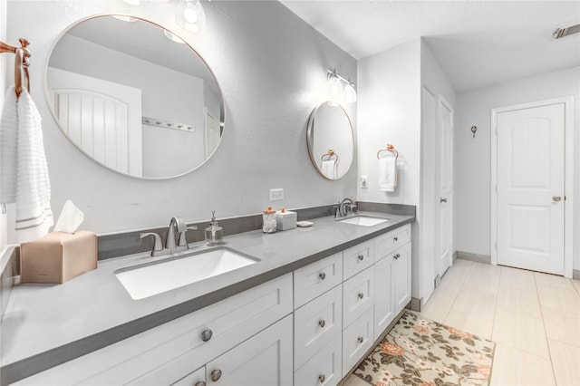 11715 Cypresswood Dr, Houston, TX 77070 - bathroom with double vanity