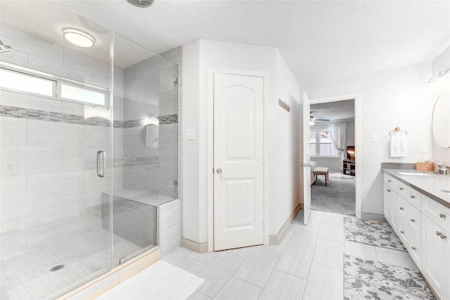11715 Cypresswood Dr, Houston, TX 77070 - ensuite bathroom with a stall shower, double vanity, and tile patterned floors