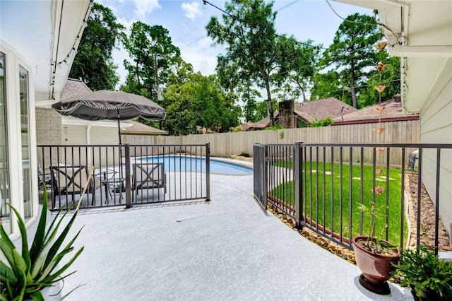 11715 Cypresswood Dr, Houston, TX 77070 - fenced backyard with a patio area