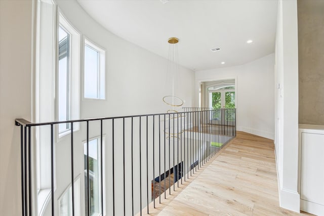 2013 Persa St, Houston, TX 77019 - hallway with wood finished floors and recessed lighting