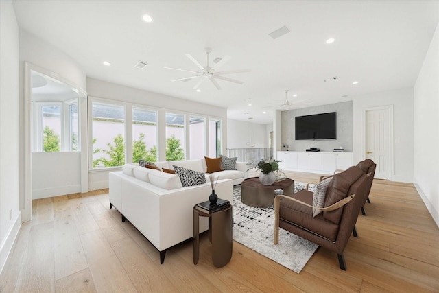 2013 Persa St, Houston, TX 77019 - living room featuring ceiling fan, light wood finished floors, and recessed lighting