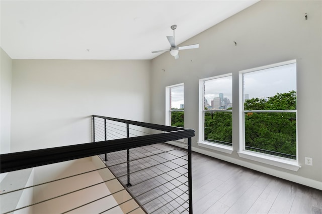 1616 Elgin St Unit 11, Houston, TX 77004 - hallway featuring vaulted ceiling and wood finished floors