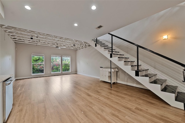 1616 Elgin St Unit 11, Houston, TX 77004 - unfurnished living room featuring light wood-type flooring, recessed lighting, and stairs