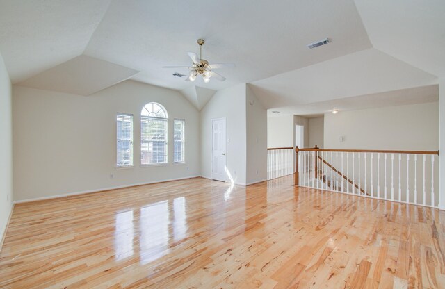 5330 Imperial Grove Dr, Houston, TX 77066 - empty room featuring wood finished floors, vaulted ceiling, and ceiling fan