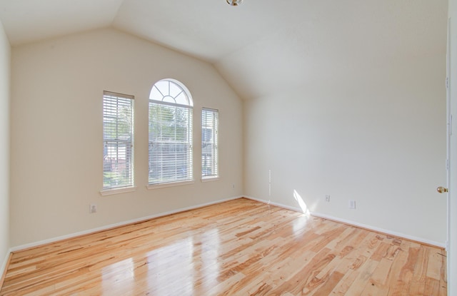 5330 Imperial Grove Dr, Houston, TX 77066 - unfurnished room with wood finished floors and vaulted ceiling