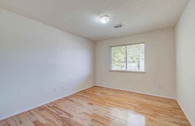 5330 Imperial Grove Dr, Houston, TX 77066 - empty room featuring wood finished floors and baseboards