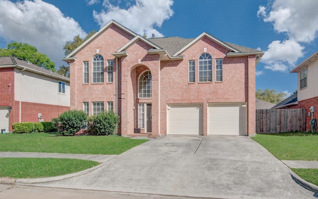 5330 Imperial Grove Dr, Houston, TX 77066 - traditional-style house featuring driveway, a garage, and brick siding