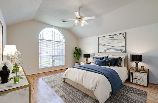 5330 Imperial Grove Dr, Houston, TX 77066 - bedroom featuring vaulted ceiling, wood finished floors, and ceiling fan