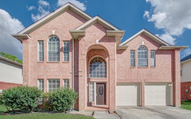 5330 Imperial Grove Dr, Houston, TX 77066 - traditional-style house featuring driveway, brick siding, and a garage