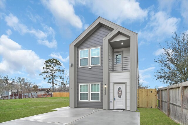 8004 Birmingham St A/B, Unit A/B Houston, TX 77028 - view of front of home with a fenced backyard and a patio area