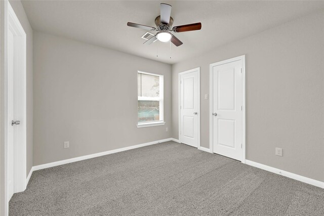 8004 Birmingham St A/B, Unit A/B Houston, TX 77028 - unfurnished bedroom featuring carpet flooring and ceiling fan
