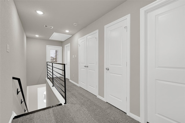 8004 Birmingham St A/B, Unit A/B Houston, TX 77028 - corridor featuring an upstairs landing, attic access, carpet, and recessed lighting