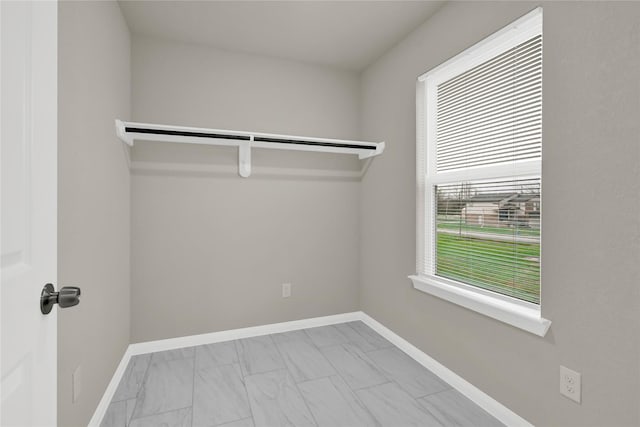 8004 Birmingham St A/B, Unit A/B Houston, TX 77028 - walk in closet with marble finish floors