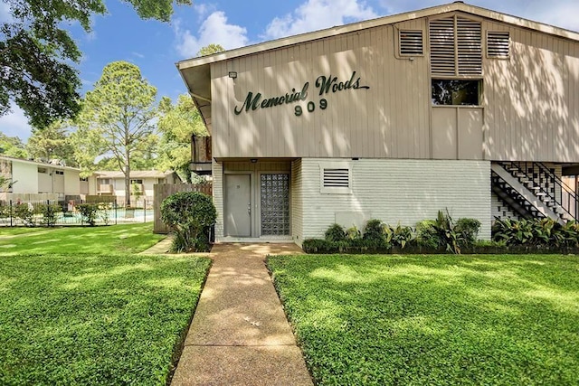 909 Silber Rd Unit 36, Houston, TX 77024 - view of front of property featuring brick siding